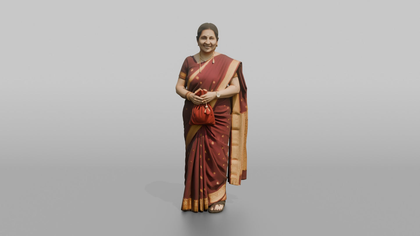 South Asian Wedding Guest Holding a Velvet Gift Pouch