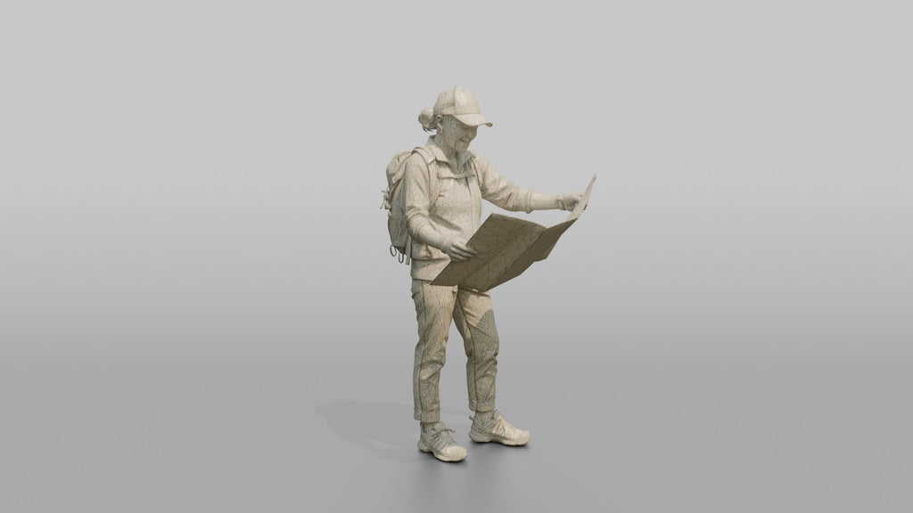 Hiker Holding a Folding Map Open