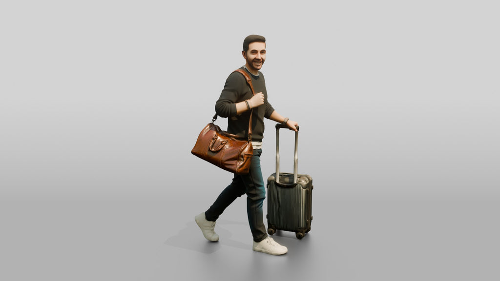 Young Man Walking with Rolling Suitcase and Leather Duffel Bag