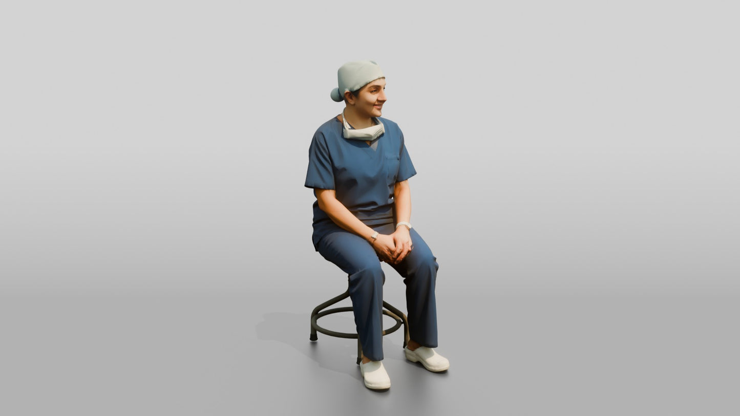 Middle-Aged South Asian Woman Doctor Sitting on Stool