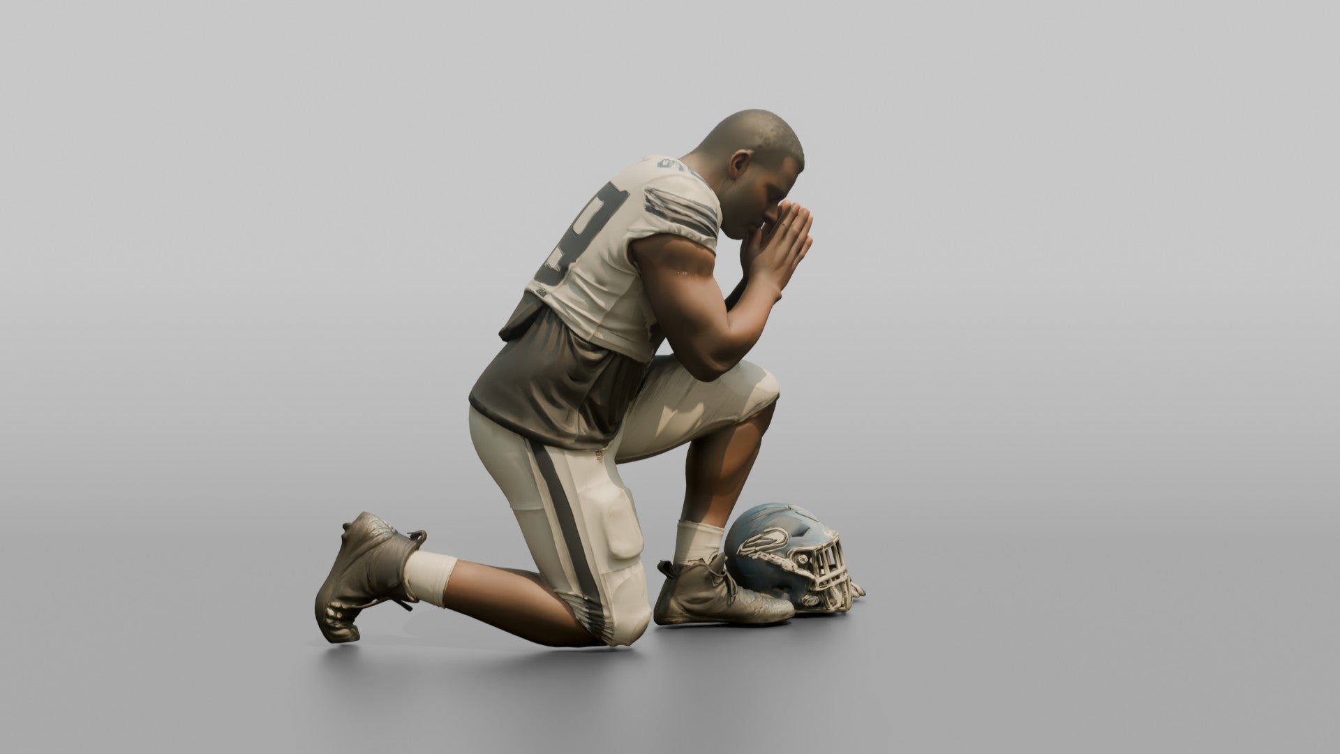 Player Kneeling in Prayer Before the Game