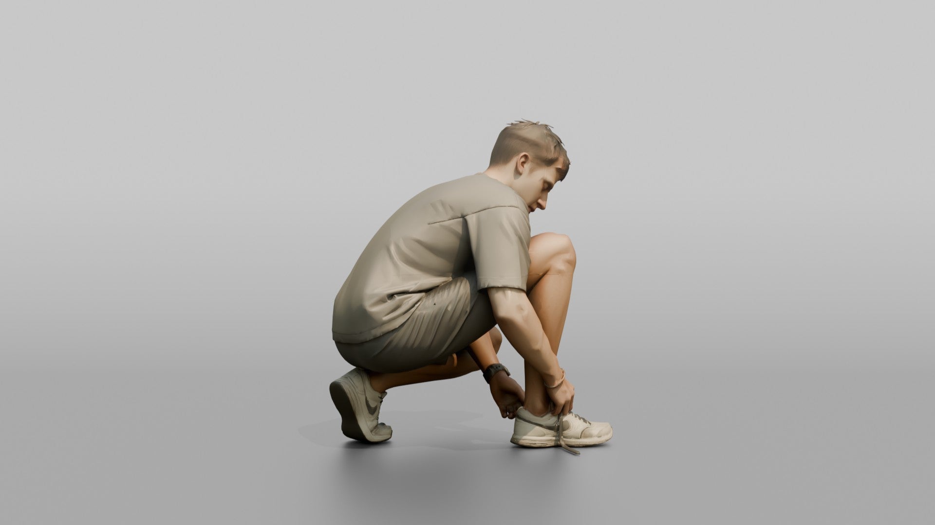 Man Crouching to Retie His Sneakers