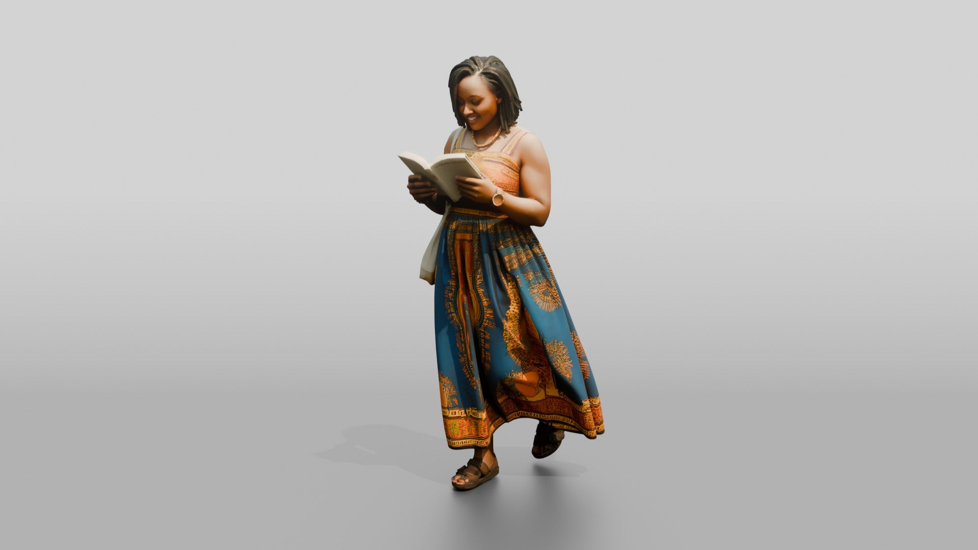 African Woman Reading a Book in a Printed Maxi Dress