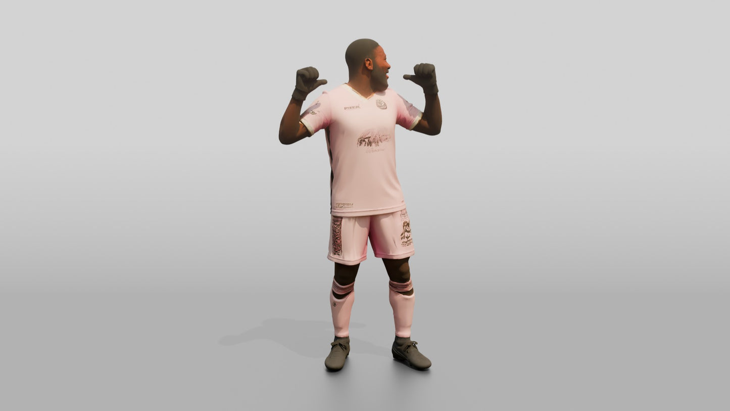 Soccer Player Pointing to Jersey Name