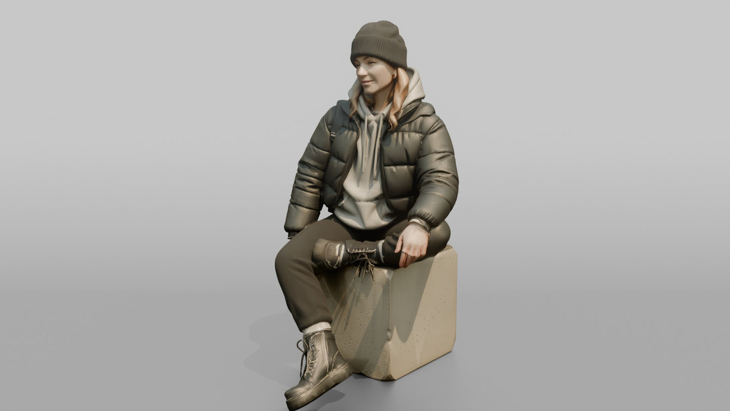 Woman Sitting in a Cropped Puffer Jacket