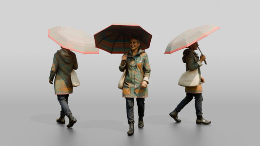 Indian Woman in Patterned Raincoat with Umbrella