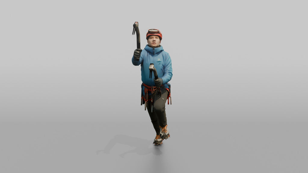 Ice Climber Holding Two Ice Axes