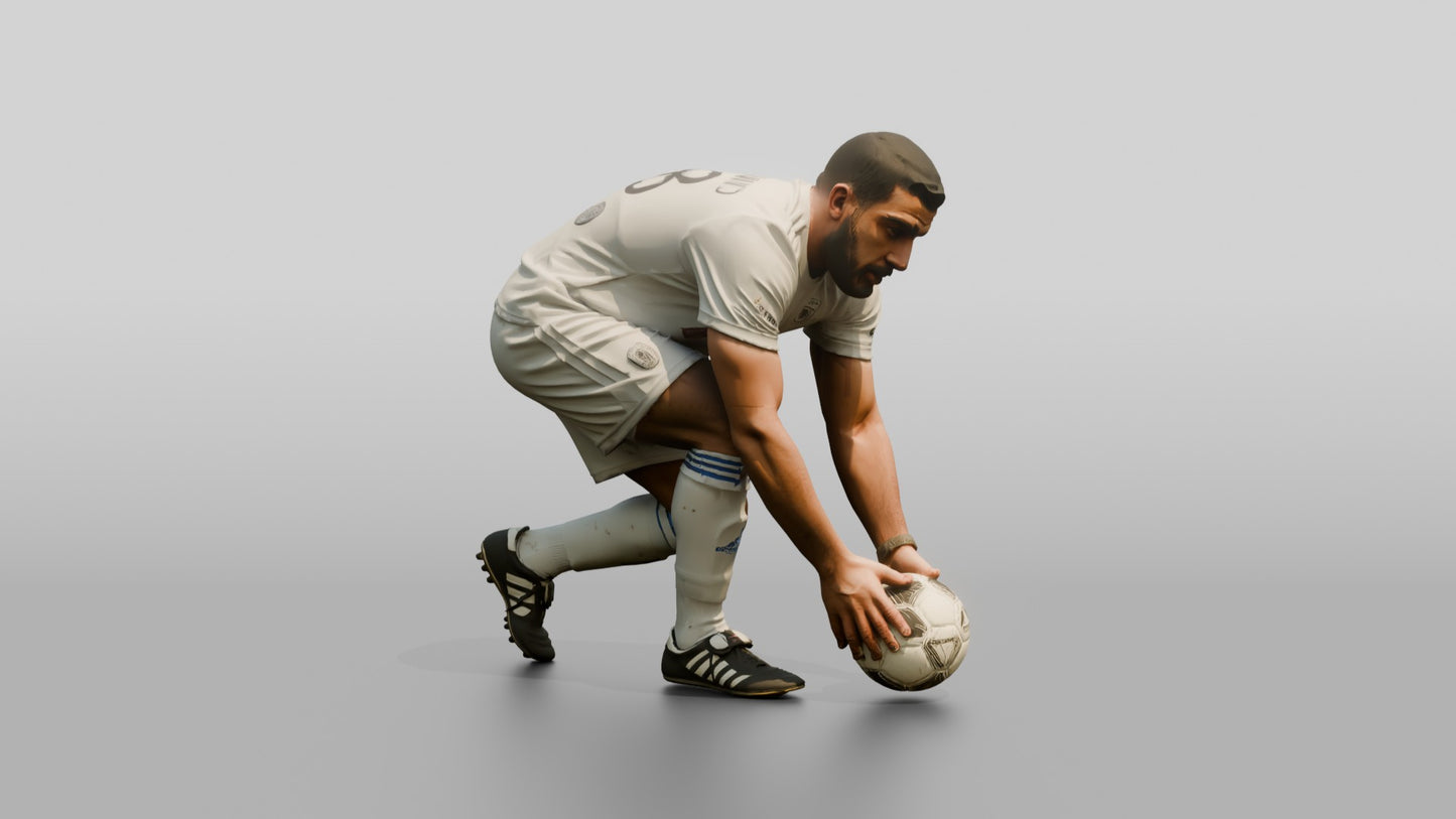 Soccer Player Placing the Ball for Penalty