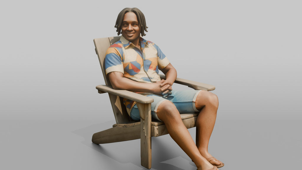 African Man with Dreadlocks Sitting in Lounge Chair