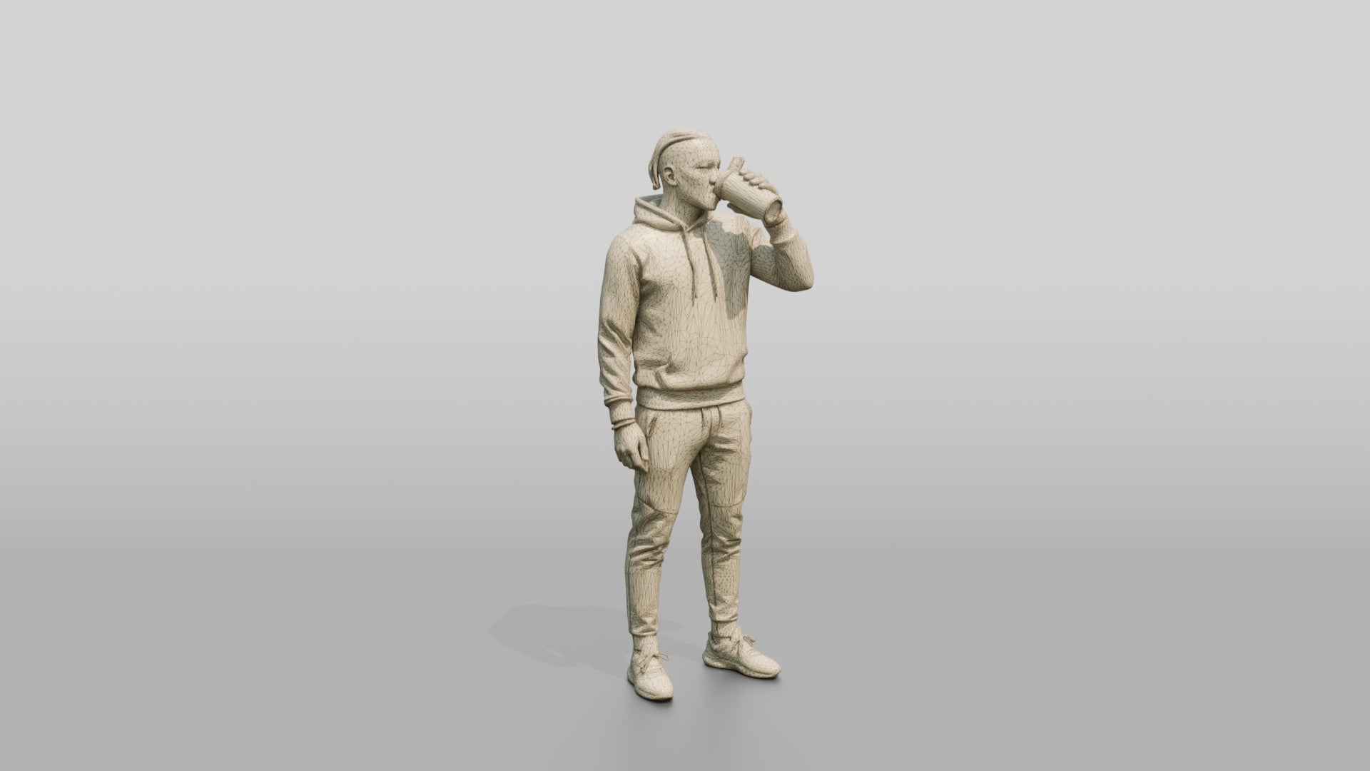 Athletic African Man Drinking Coffee in a Geometric Print Hoodie