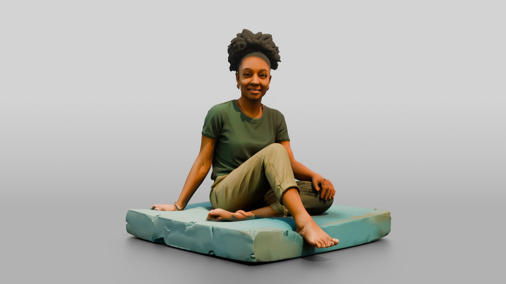 Homeless Woman Sitting on a Piece of Foam Padding