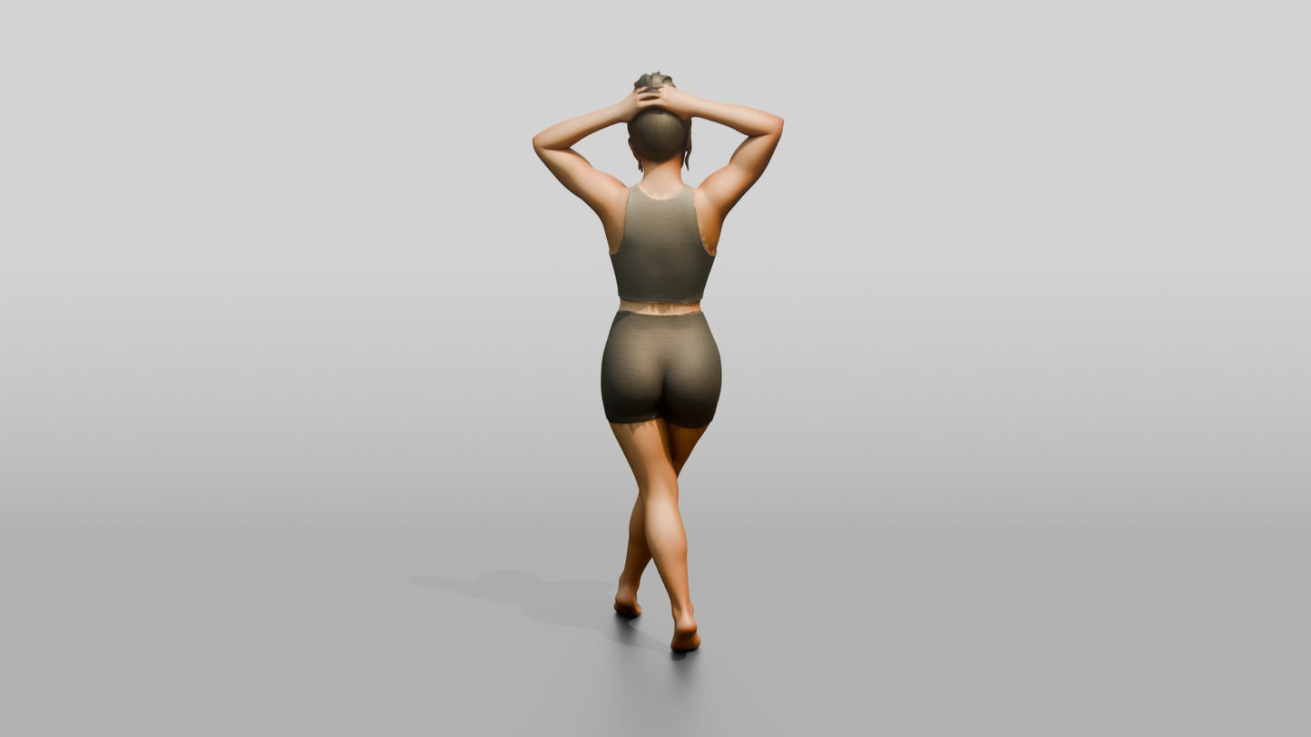 Woman in Olive Activewear with Hands in Her Hair