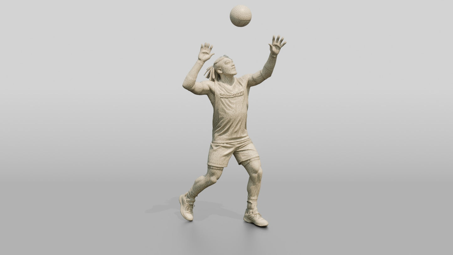 Male Volleyball Player in Cyan and Black Kit
