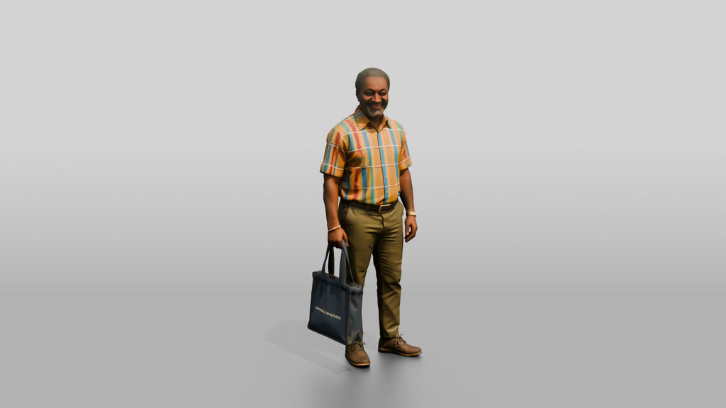 African Man in a Kente Print Shirt with a Shopper Bag