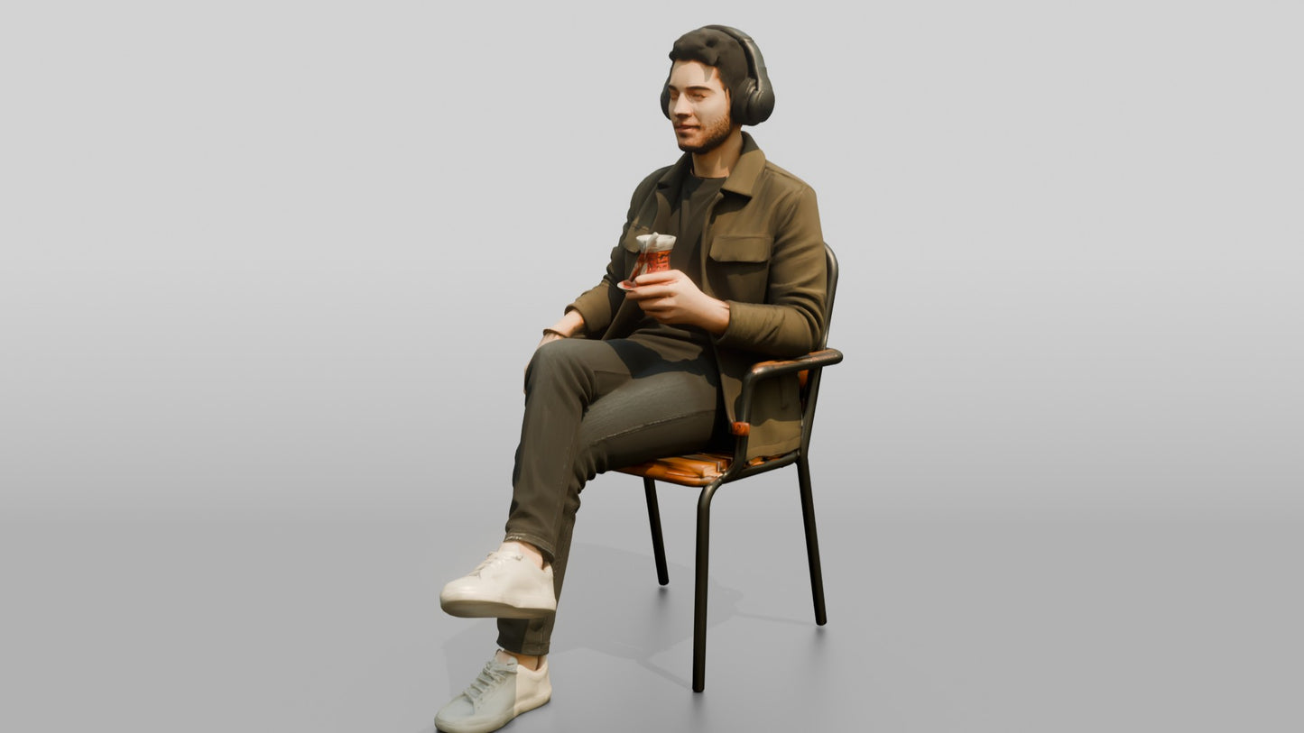Man Listening to Music with Tea