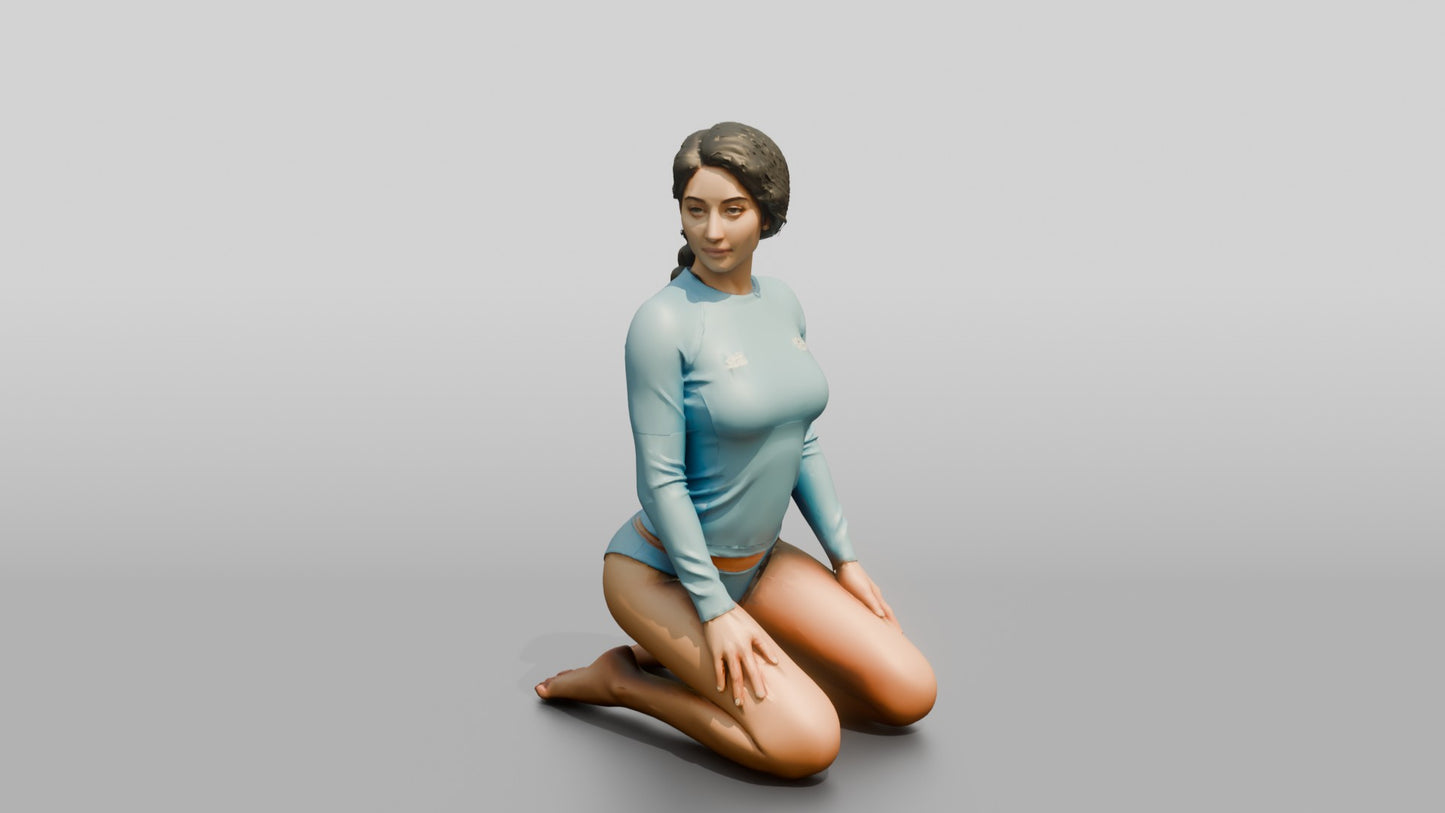 Woman in Blue Rash Guard Kneeling