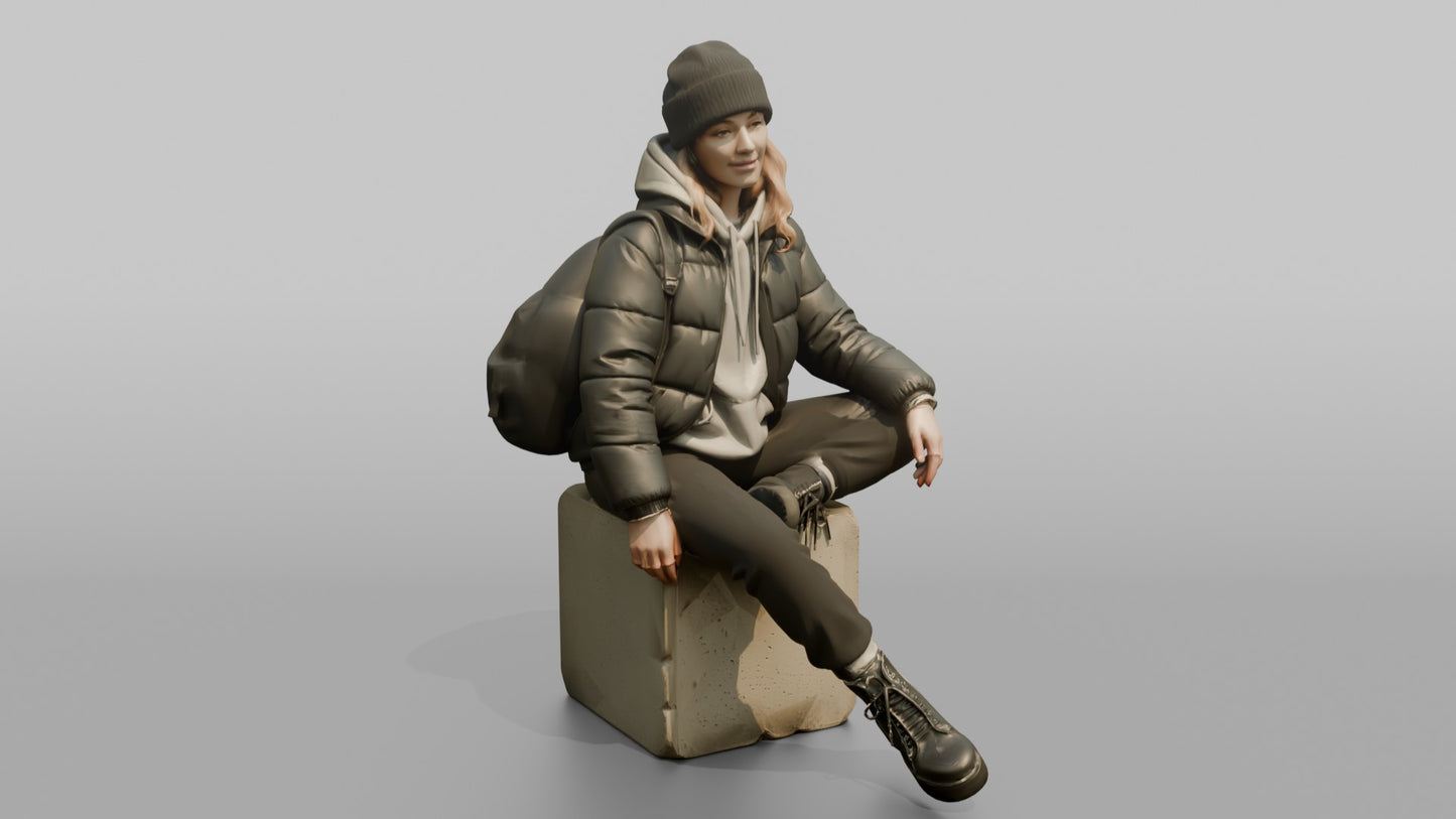 Woman Sitting in a Cropped Puffer Jacket