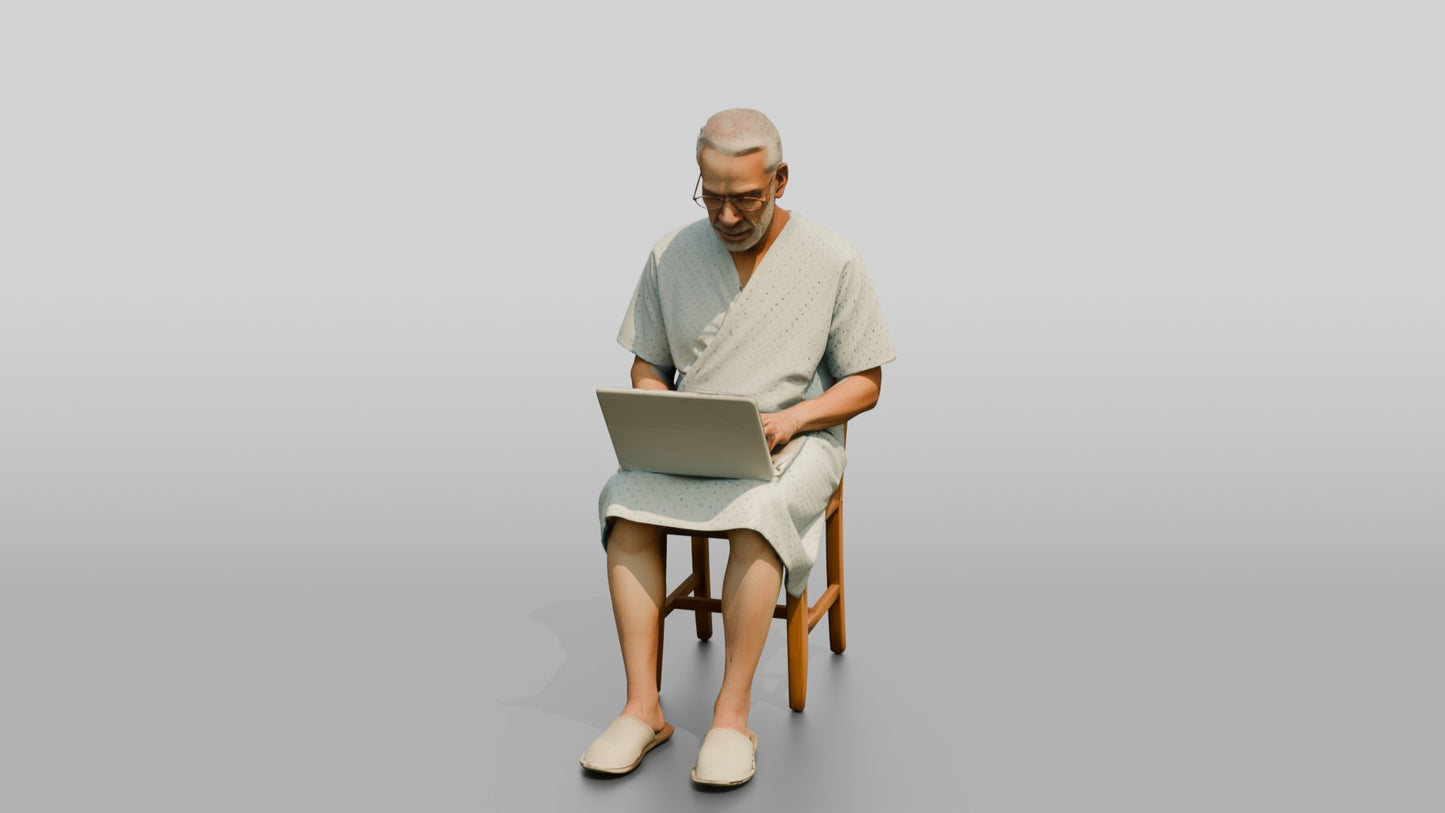 Elderly Man Patient Using a Laptop