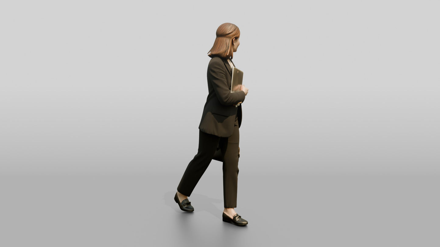 Woman Carrying a Laptop to a Meeting