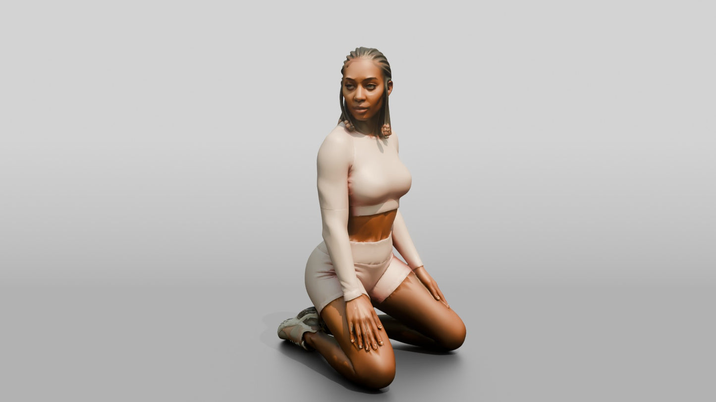 Woman with Braids Kneeling in Blush Activewear