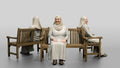 Elderly Iraqi Woman in Hijab Smiling on a Bench