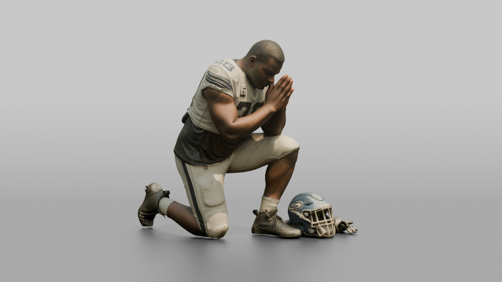 Player Kneeling in Prayer Before the Game