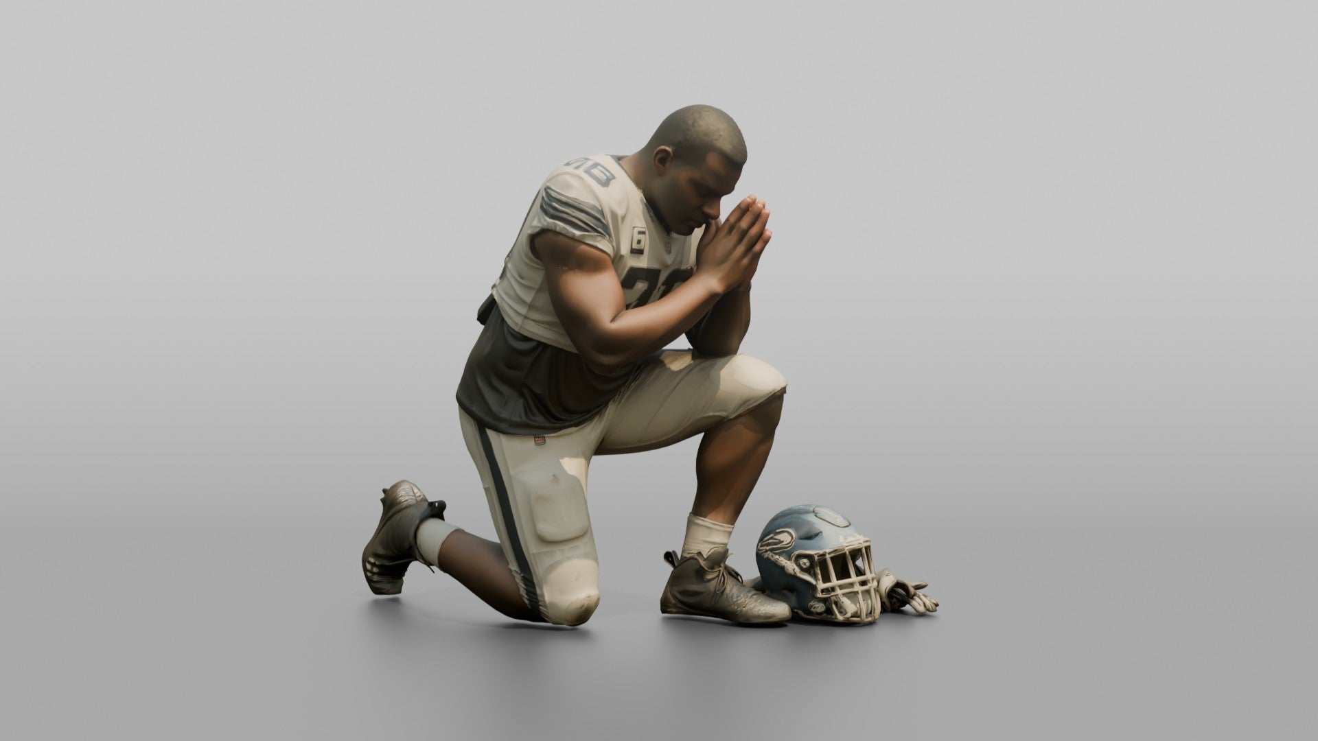 Player Kneeling in Prayer Before the Game
