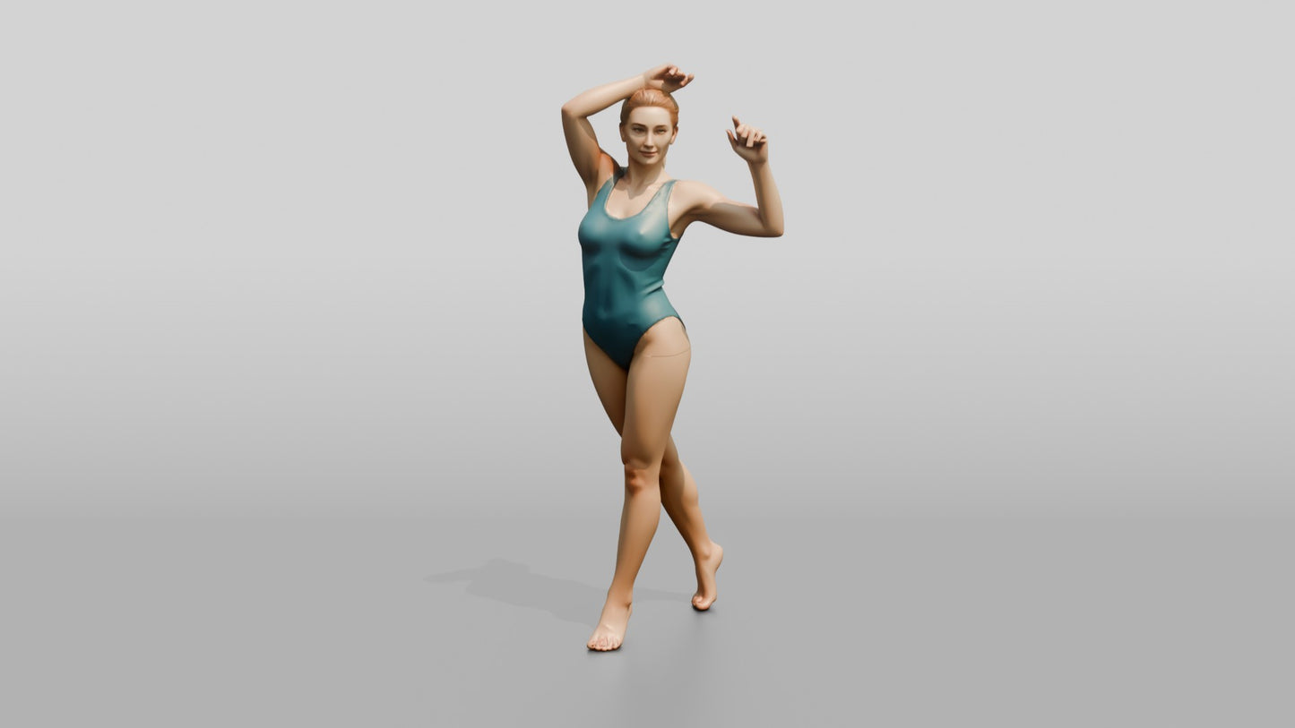 Woman in Teal Swimsuit in a Dancing Pose