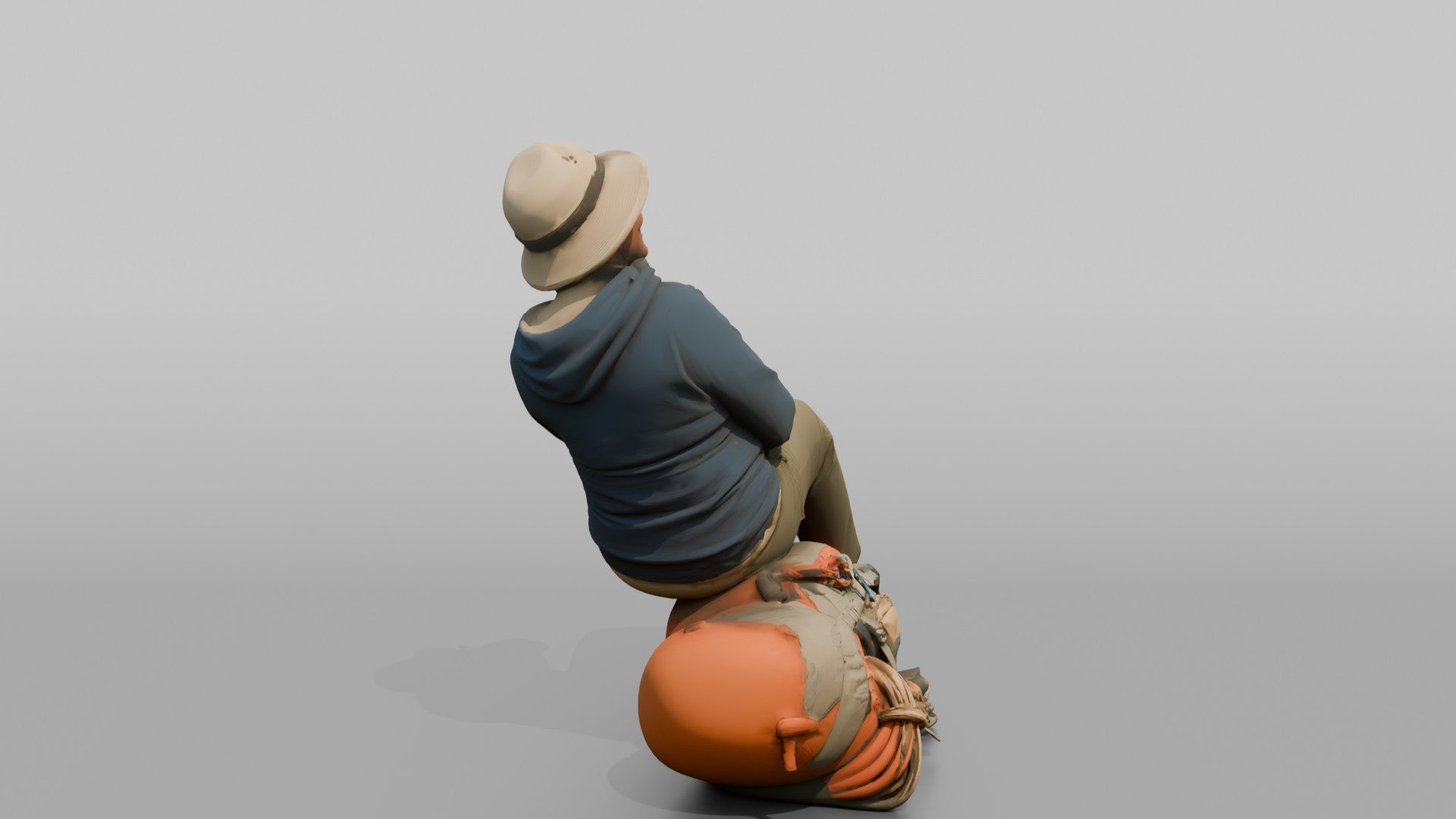 Hiker Sitting on Her Backpack, Taking a Break