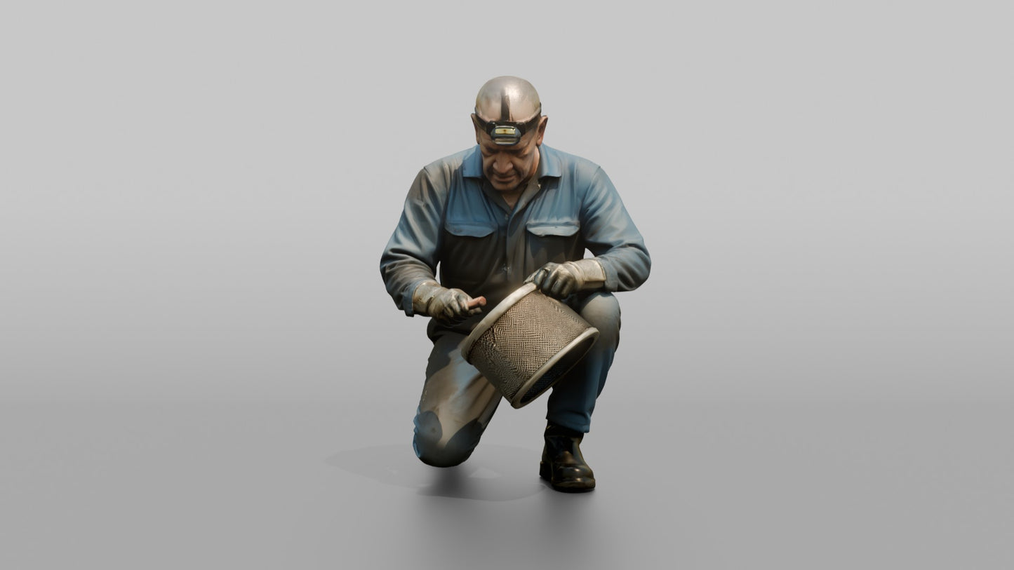 Engineer Cleaning a Turbine Filter in the Bilge