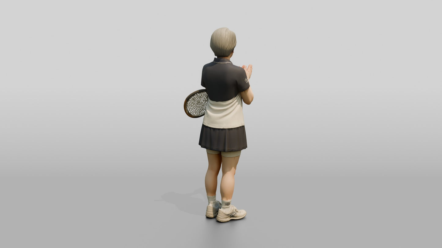 Senior Female Tennis Player Applauding a Point