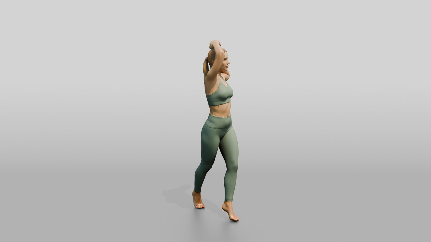 Blonde Woman Tying Her Ponytail in Sage Activewear