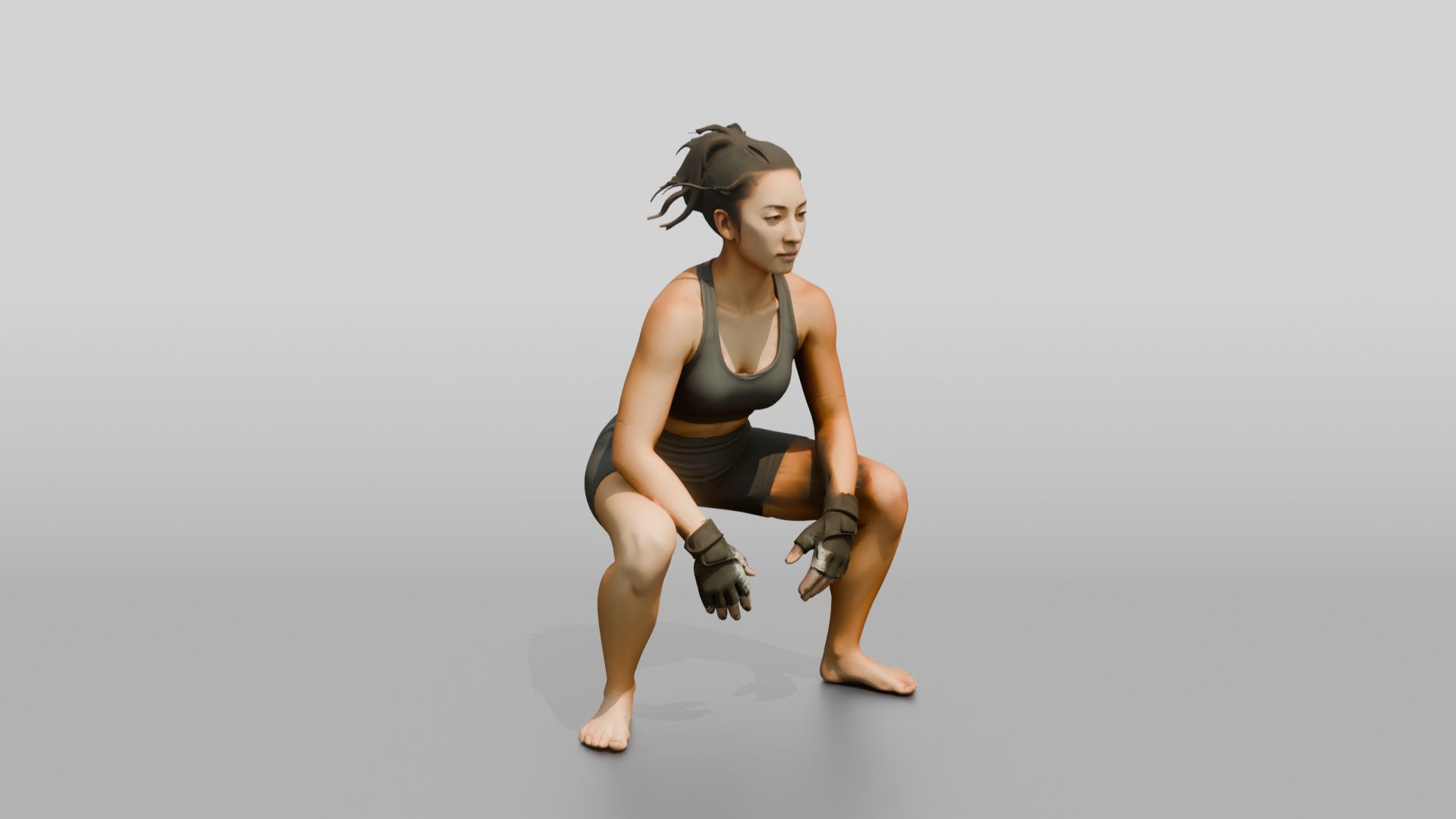 Woman Squatting with Fitness Gloves