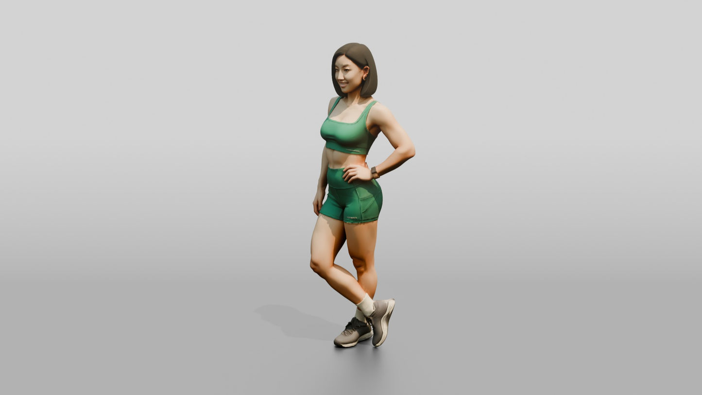Woman in Green Sports Bra and Shorts Hand on Hip
