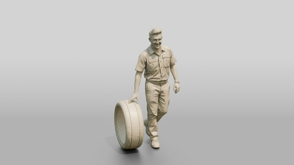 Mechanic Rolling a Performance Tire