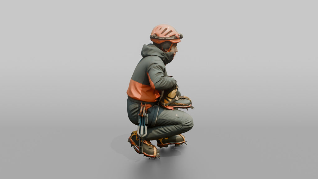 Ice Climber Crouched in an Active Posture