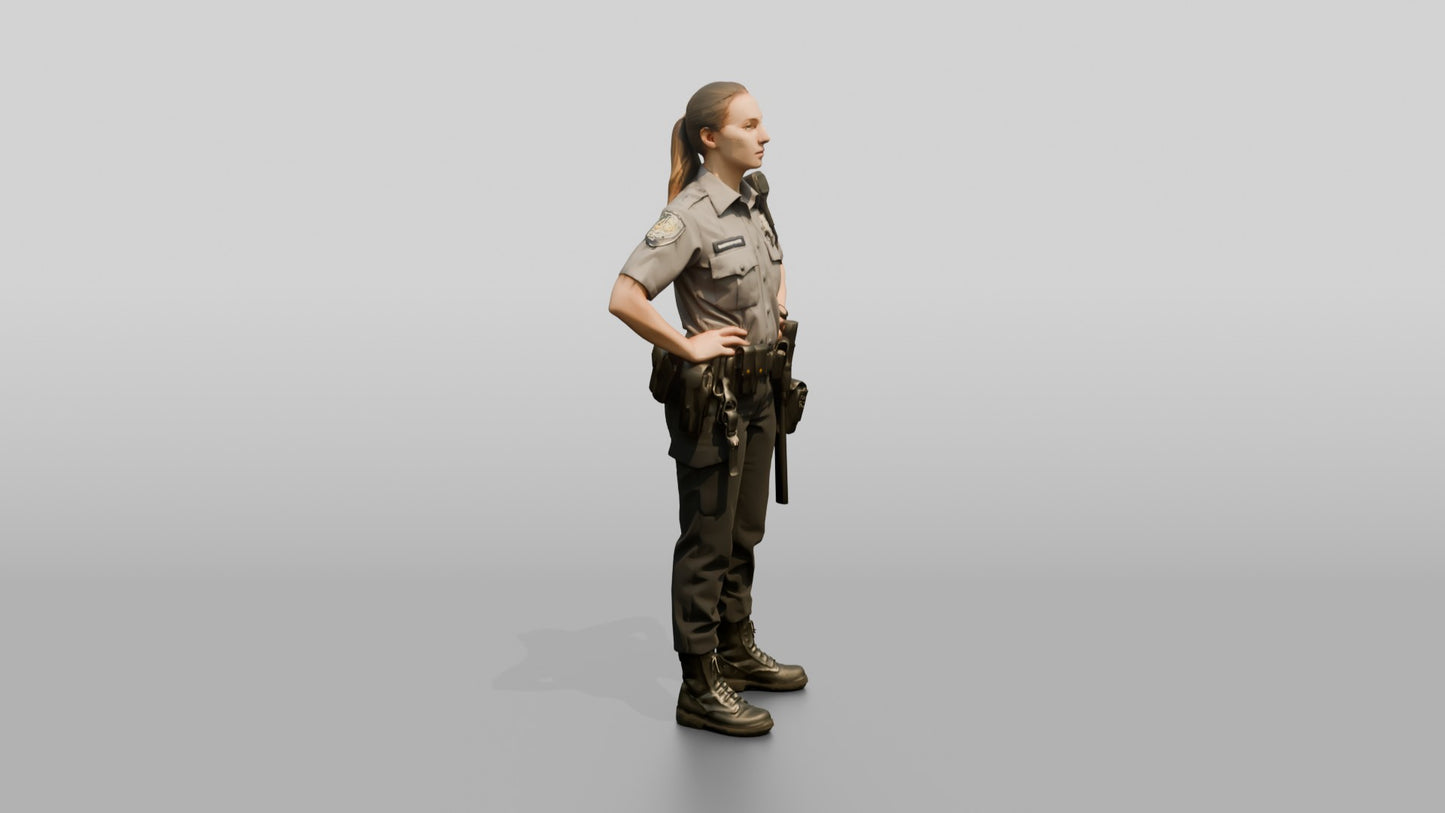 Caucasian Female Guard in a Grey Patrol Shirt and Dark Trousers