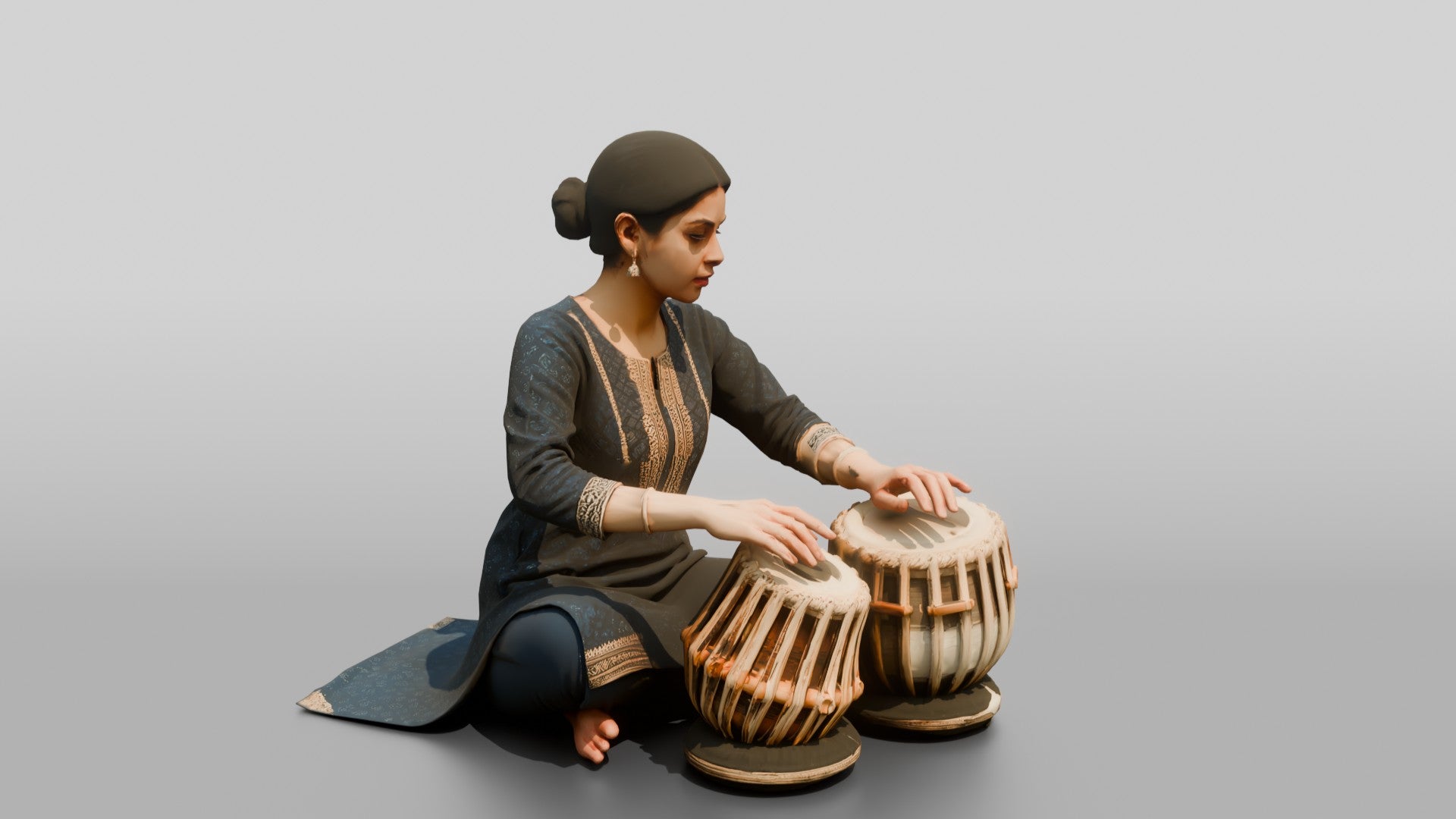 Tabla Player Seated with Twin Drums