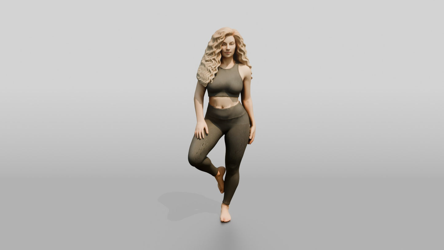 Blonde Woman in Charcoal Activewear in Tree Pose