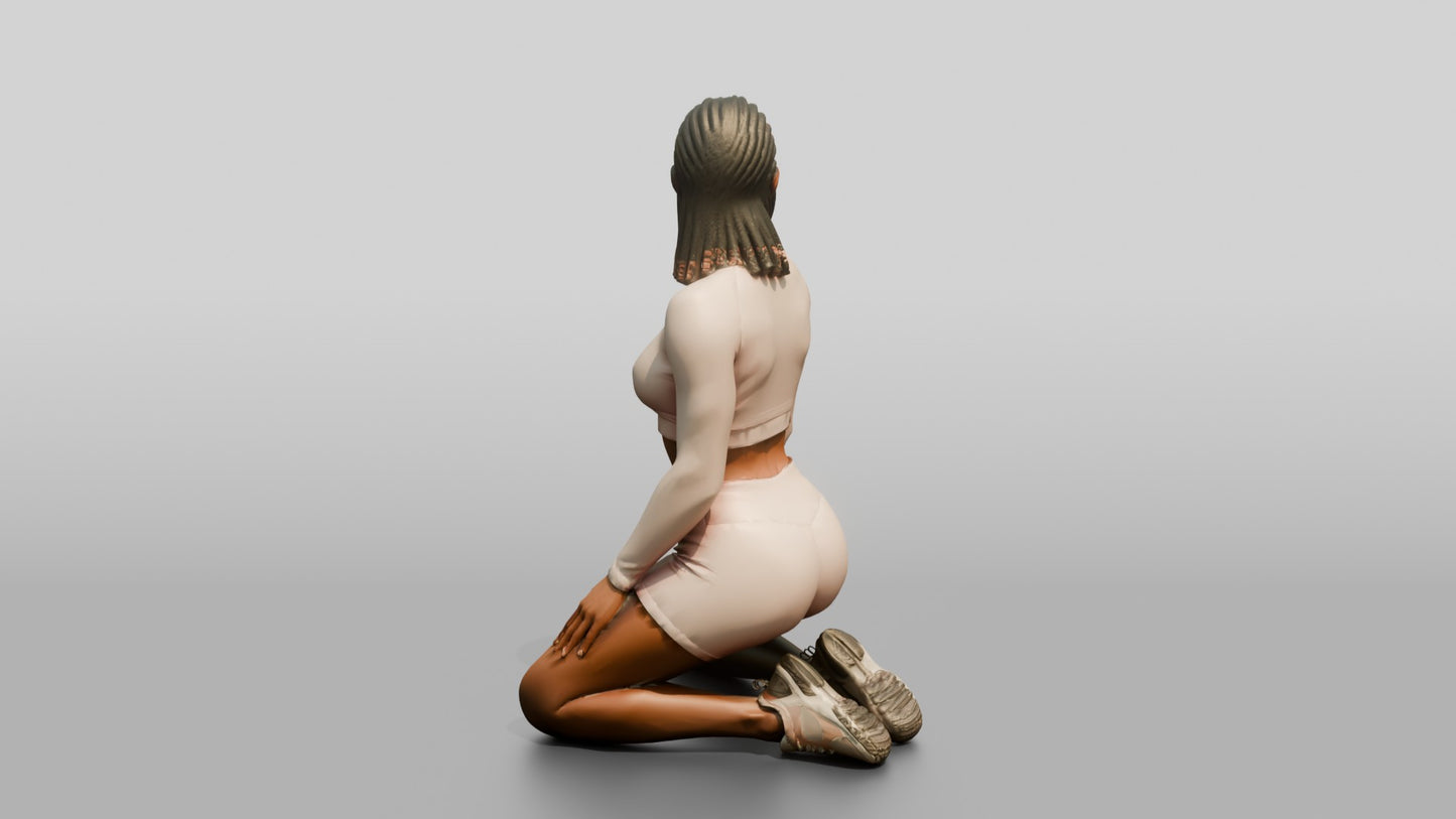 Woman with Braids Kneeling in Blush Activewear