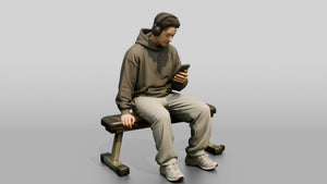 Man Sitting Checking Smartphone - 3D character model, view 1