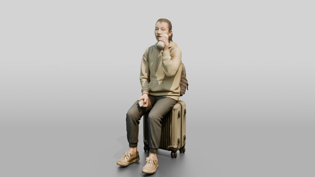 Young Woman Seated on Suitcase Drinking from Travel Cup