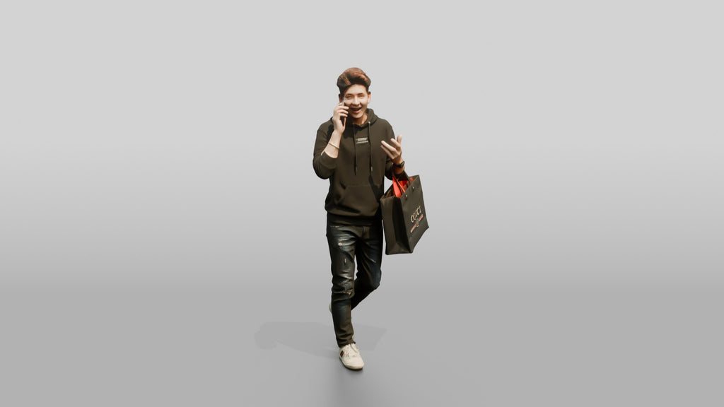 Young Chinese Man Shopping and Talking on Phone