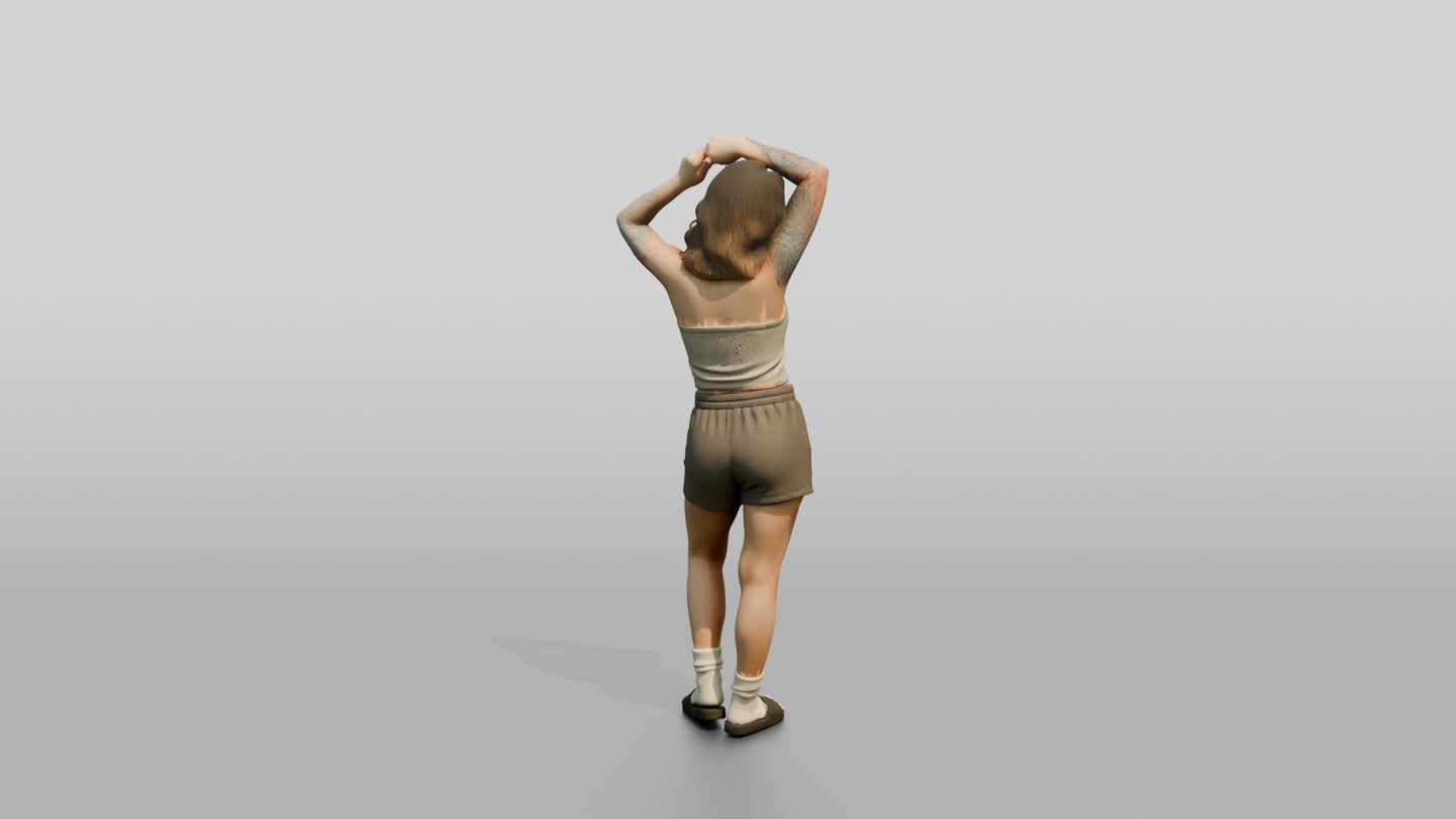 Woman Running Hands Through Wavy Hair in Cream Outfit