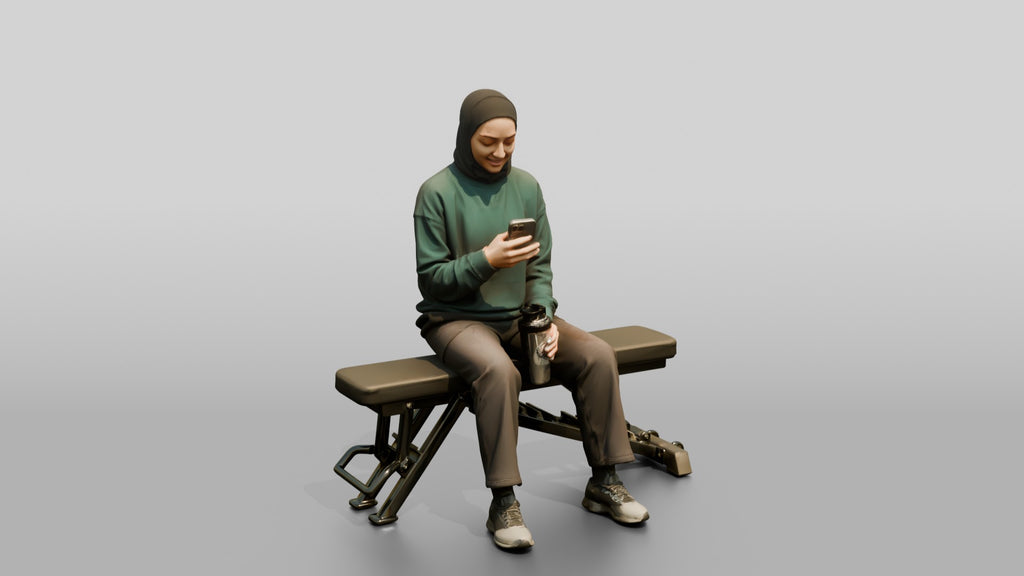 Woman in Sports Hijab Sitting