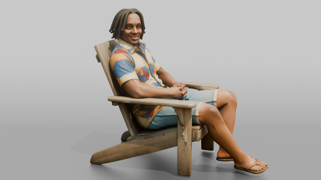 African Man with Dreadlocks Sitting in Lounge Chair