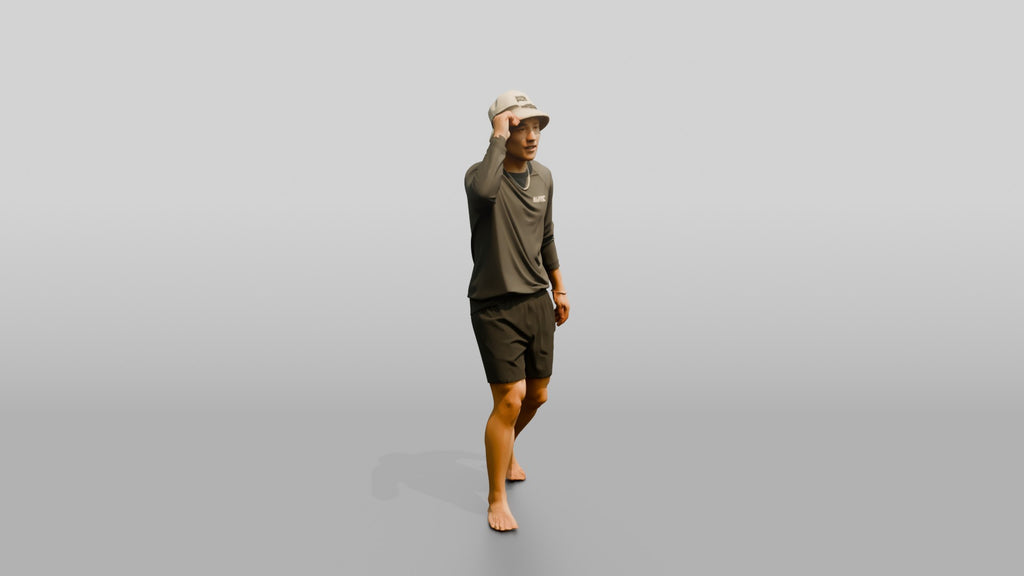 Man Adjusting Bucket Hat Brim