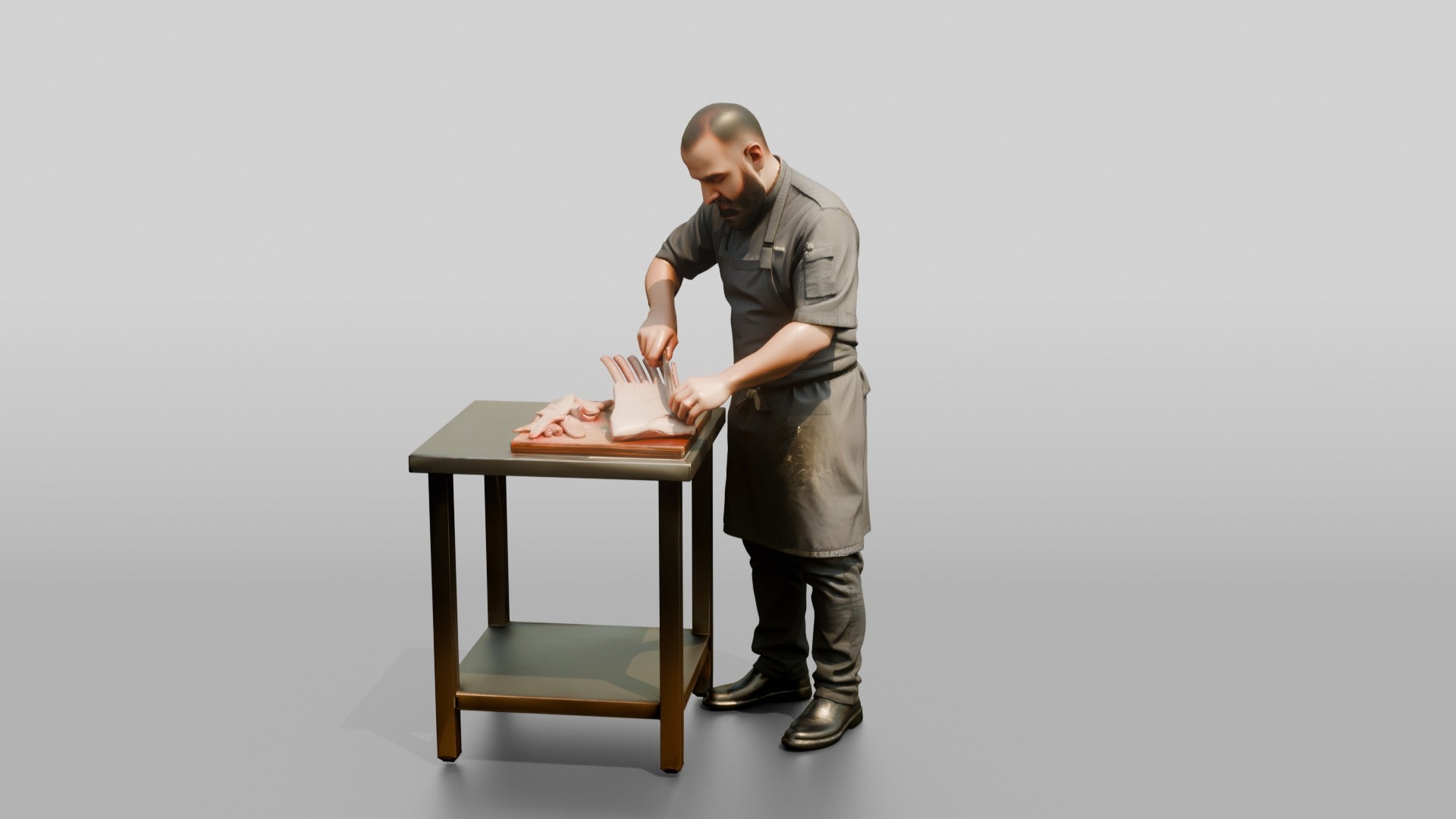 Chef Trimming Rack of Lamb