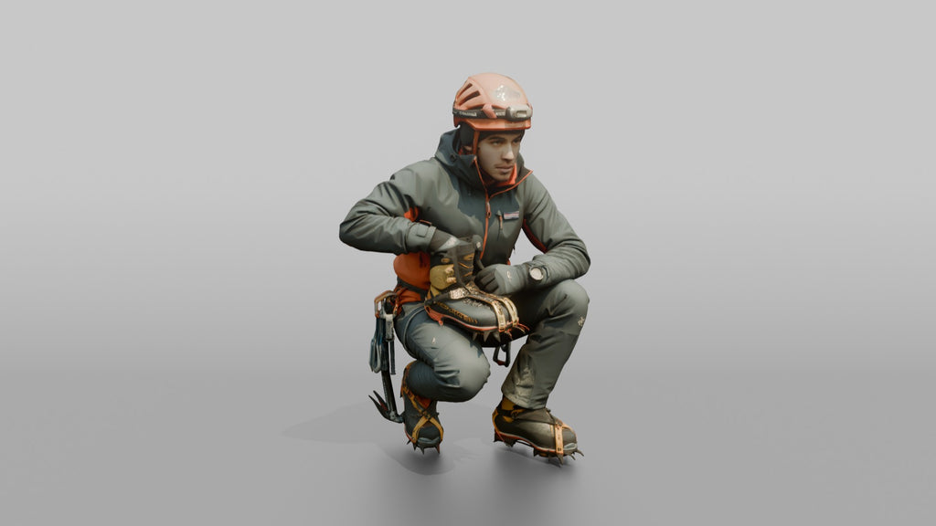 Ice Climber Crouched in an Active Posture
