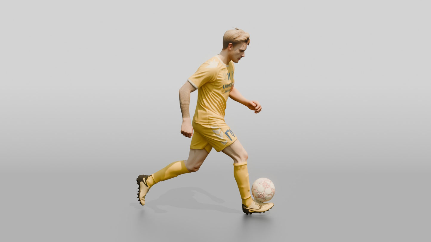 Soccer Player Trapping the Ball
